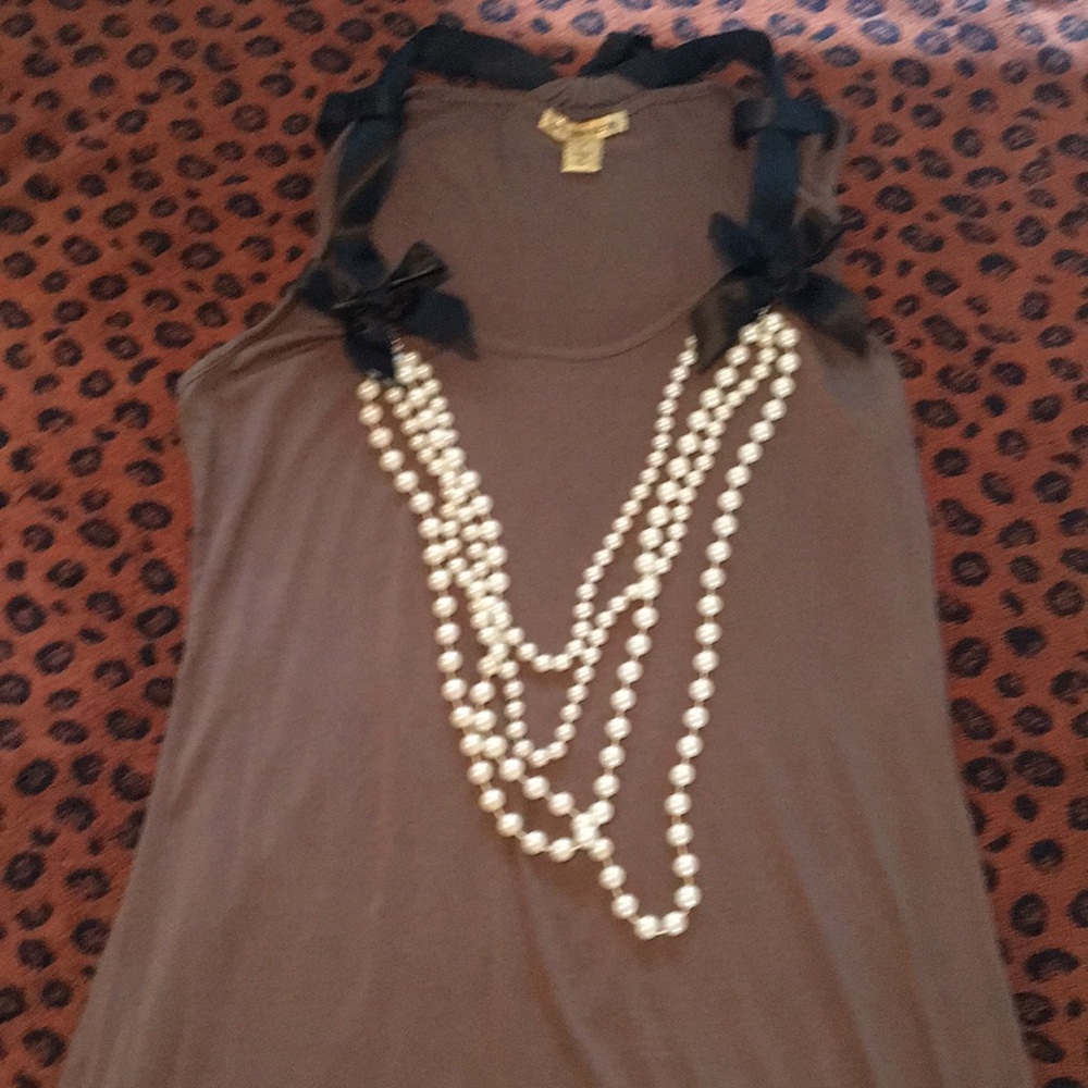 Tan sleeveless shirt with pearls